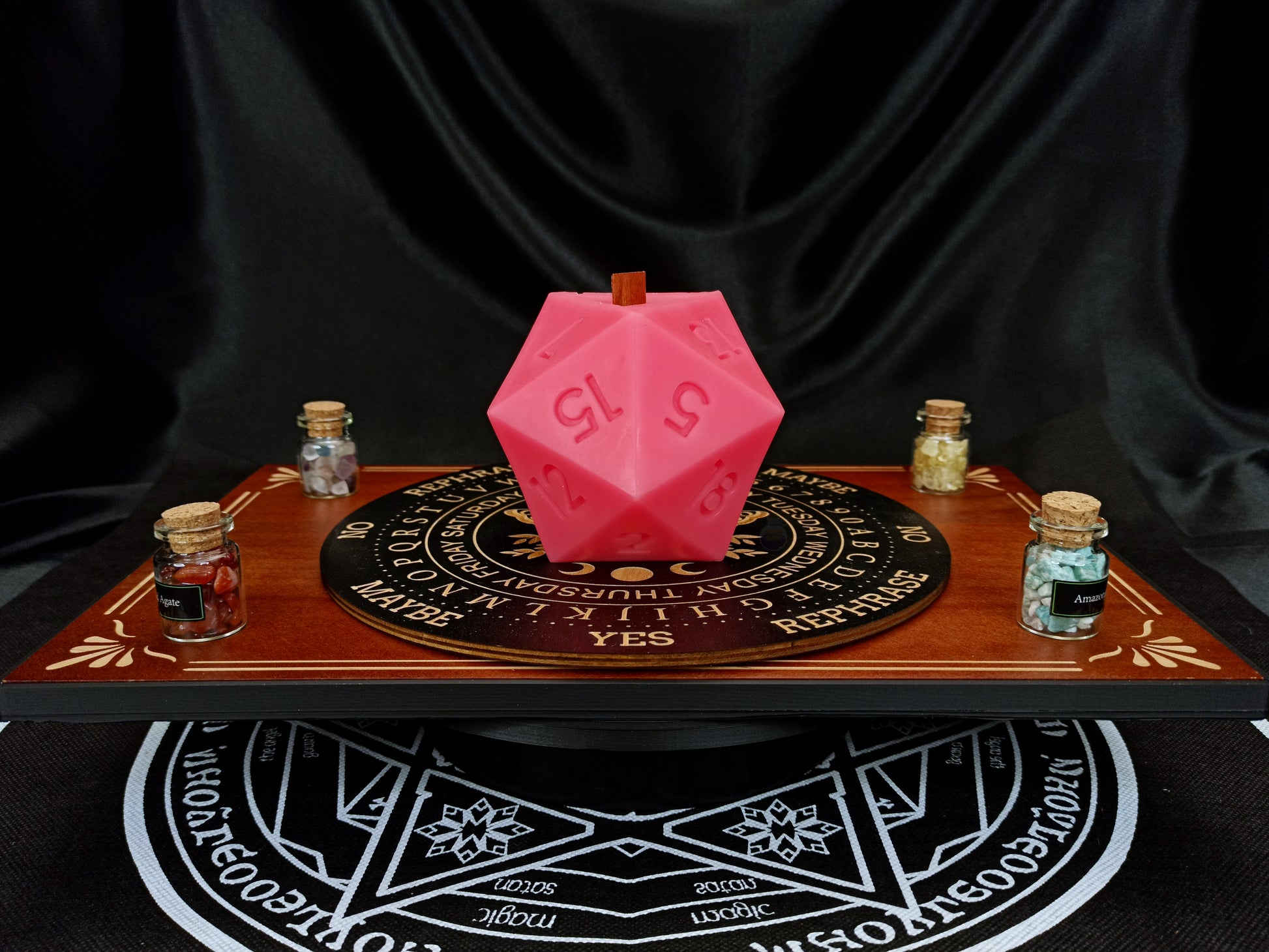 D20 ritual dice candle lit, wooden wick burning
